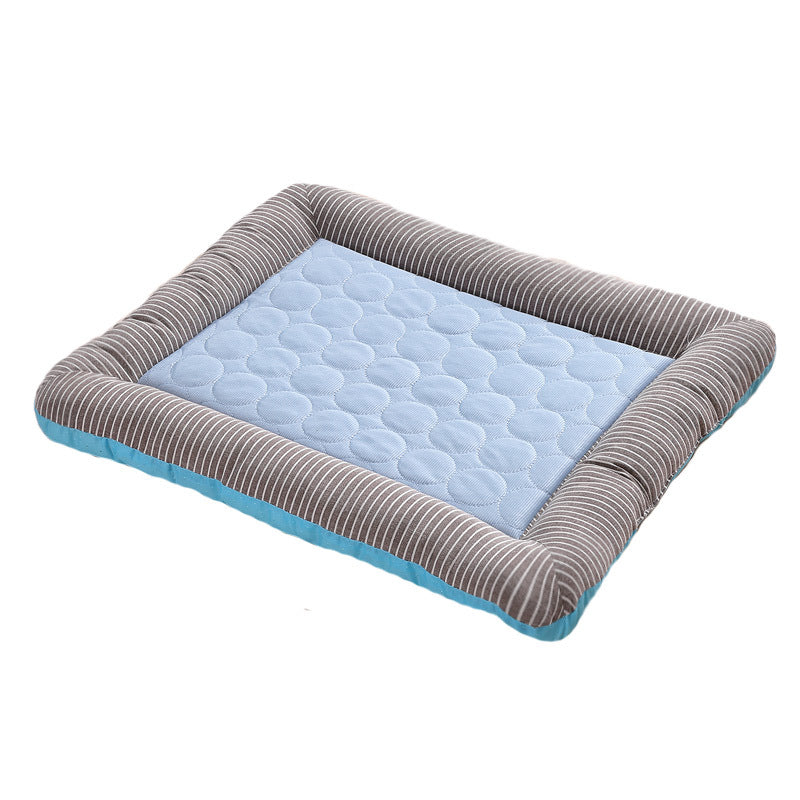 Chill Pad ice-silk cooling dog bed mat in blue, angled view