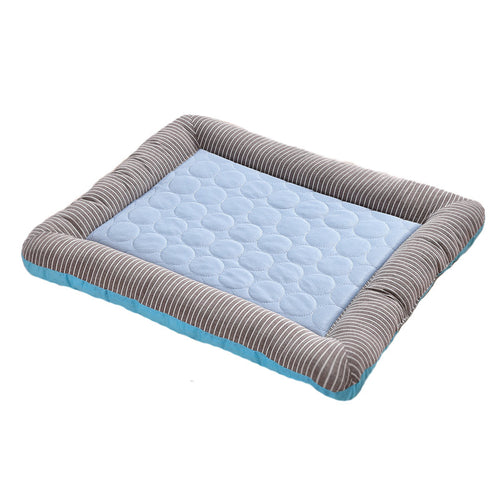 Chill Pad ice-silk cooling dog bed mat in blue, angled view